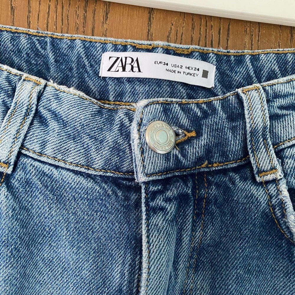 Zara size 24 straight legged ripped jeans